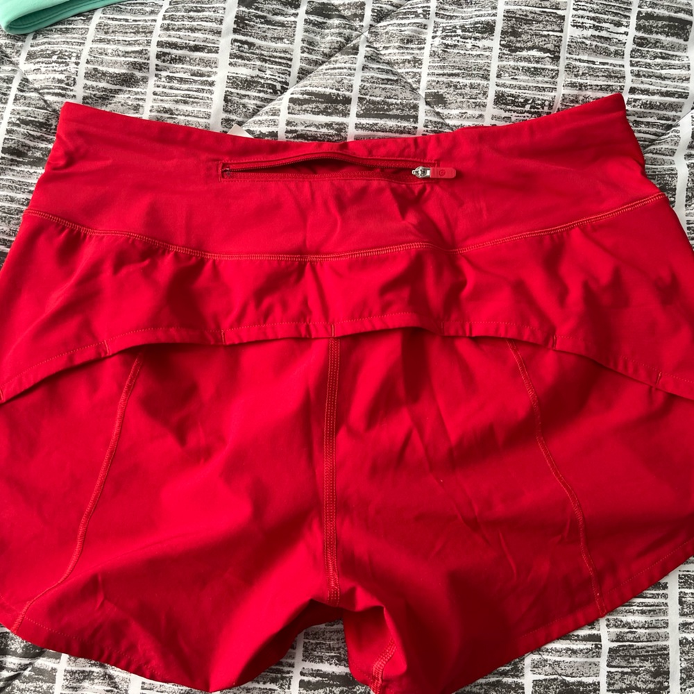 Lululemon Speed Up Red Shorts in a size 6 Tall.